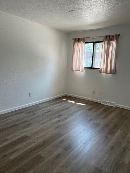 Upstairs west bedroom, south facing window. - 6396 E Mississippi Ave