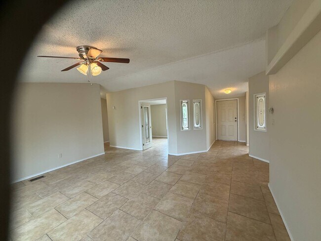 Building Photo - 6575 N Pelto Path