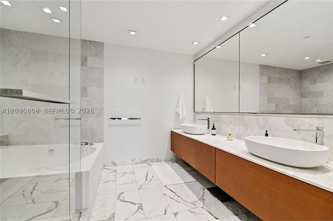 Building Photo - 10203 Collins Ave