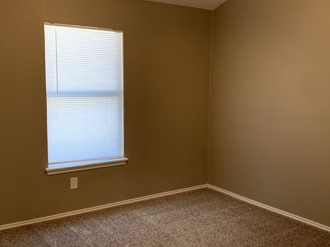 Building Photo - Spacious South Lubbock Townhome with Bonus Space & 2-Car Garage
