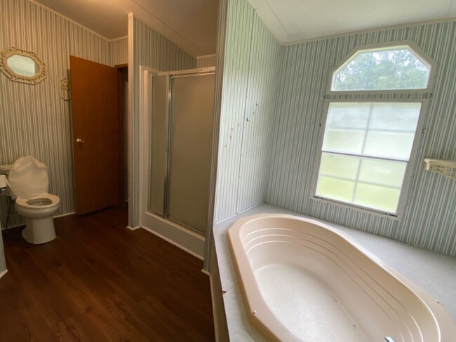 Building Photo - 3 bedroom 2 bath Mobile Home on 1 acre in ...