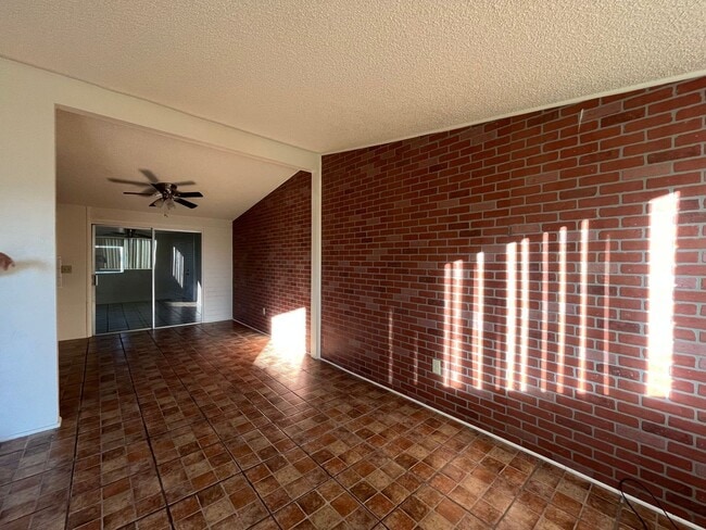 Building Photo - 3 bedroom 1 bath home with yard and covered parking