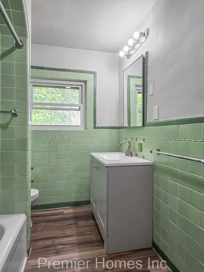 Building Photo - 3 Bed Home with Finished Attic & Hardwood Floors – $1,495/mo