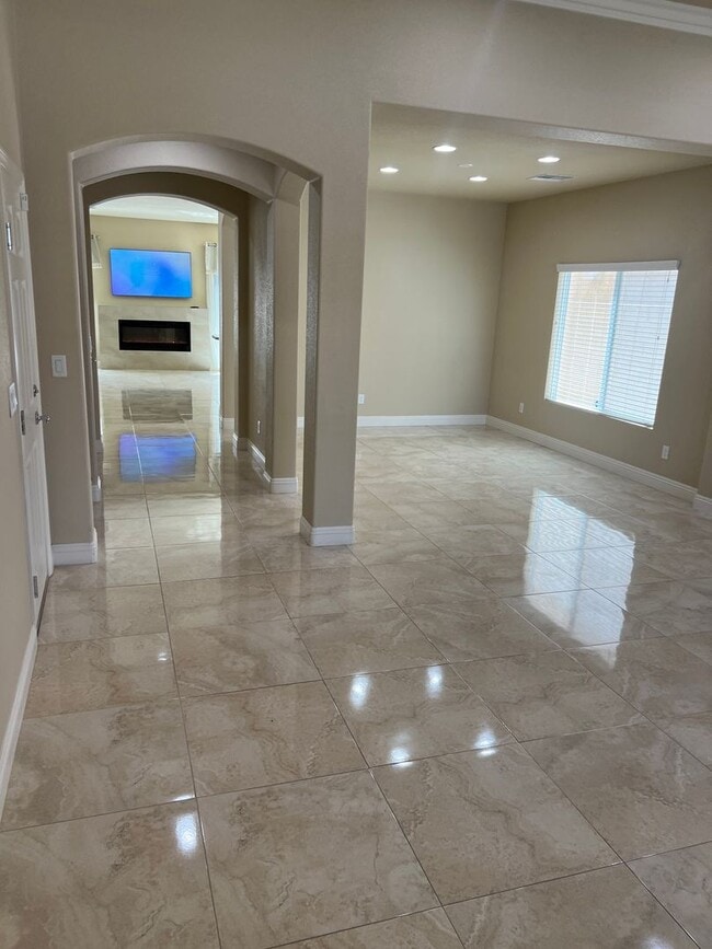 Building Photo - A Fantastic 4 Bedroom Home with the primary Downstairs, in Silverado Ranch