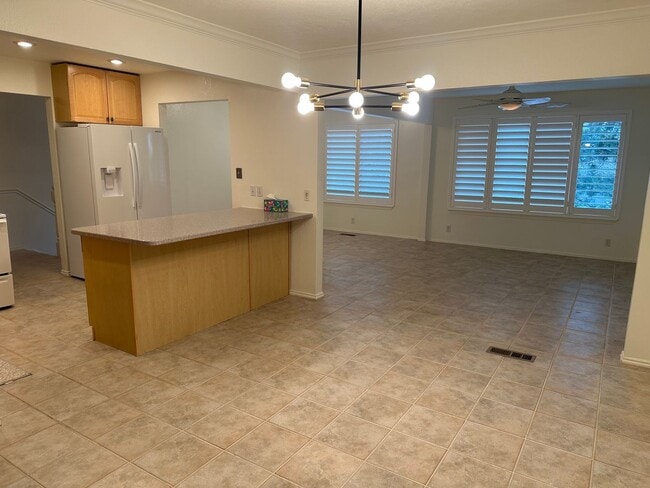 Building Photo - Spacious Millcreek Townhome with Two Living Areas, Private Deck & Community Amenities