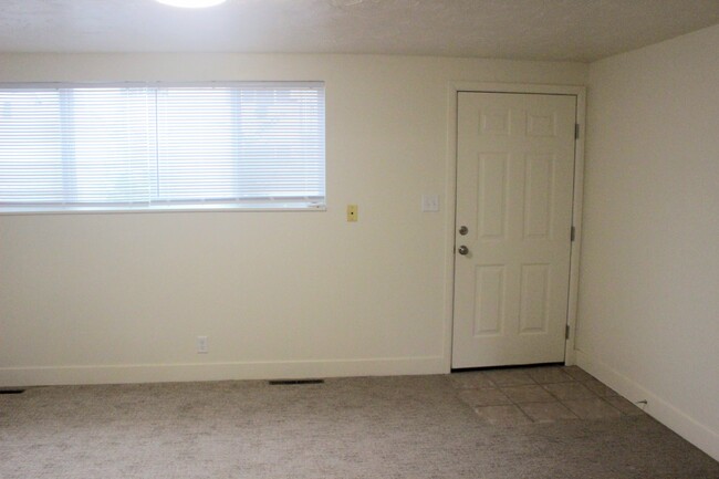 Front door and living room. - 338 E 1600 S