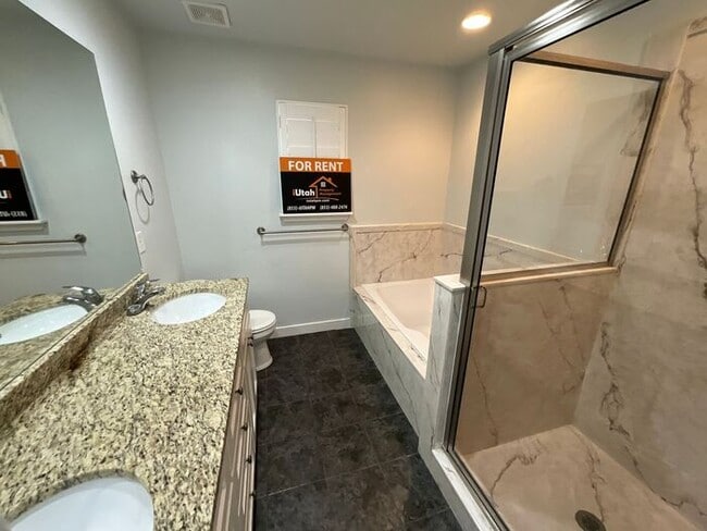 Building Photo - 4 bdrm 3 bth Home 2 Car Garage- Small Dog ...