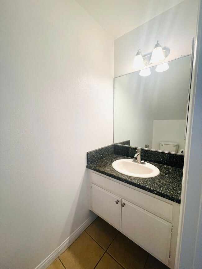 Building Photo - Todd Ranch Condo Welcome to the Todd Ranch Condo, 3-bedroom, 2-bathroom home located in the vibra...