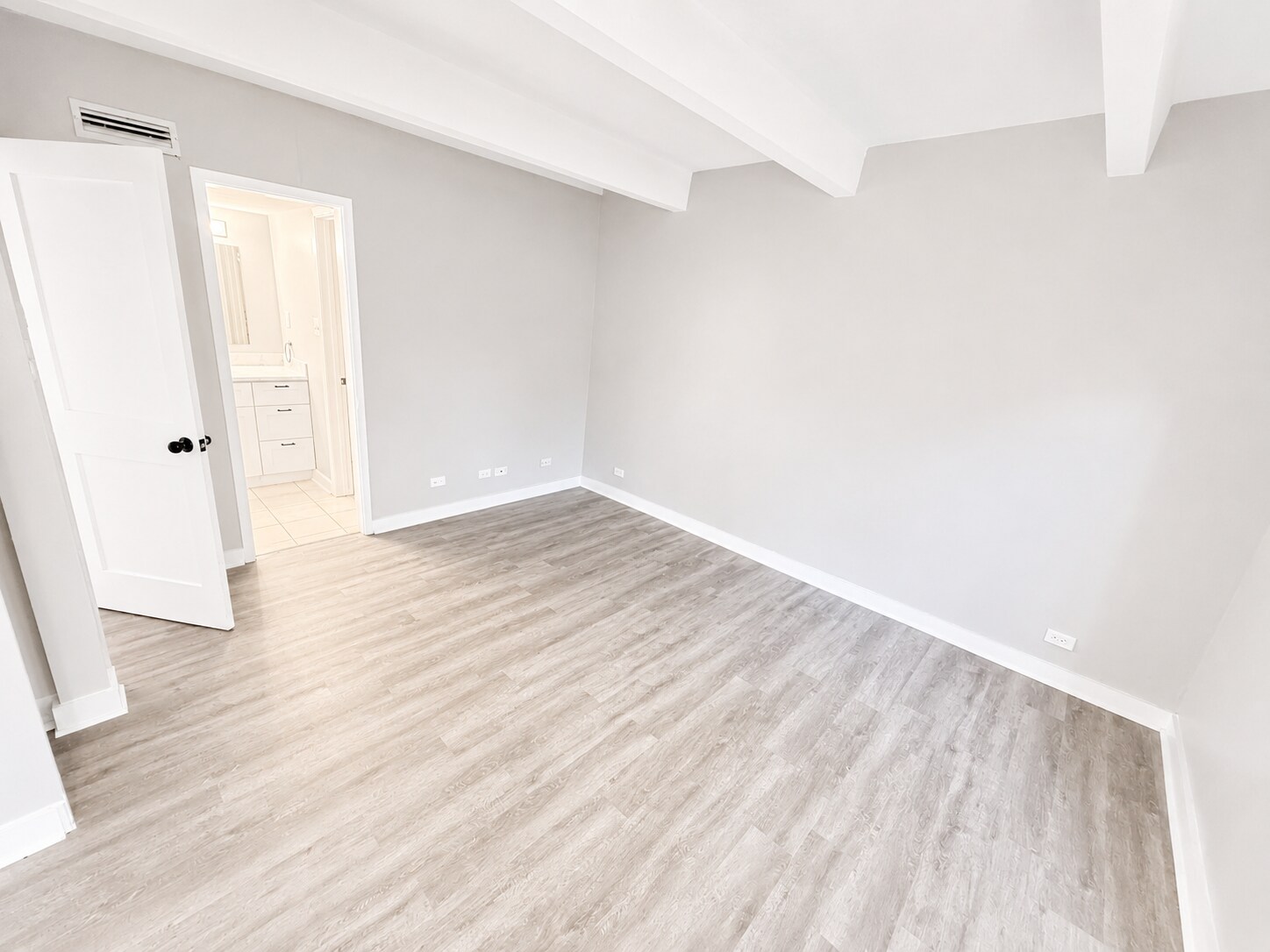 Bedroom into bathroom - 9725 E Harvard Ave