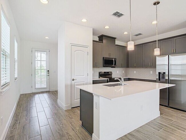 Building Photo - Gorgeous 3/2 Modern Home with a 2 Car Gara...