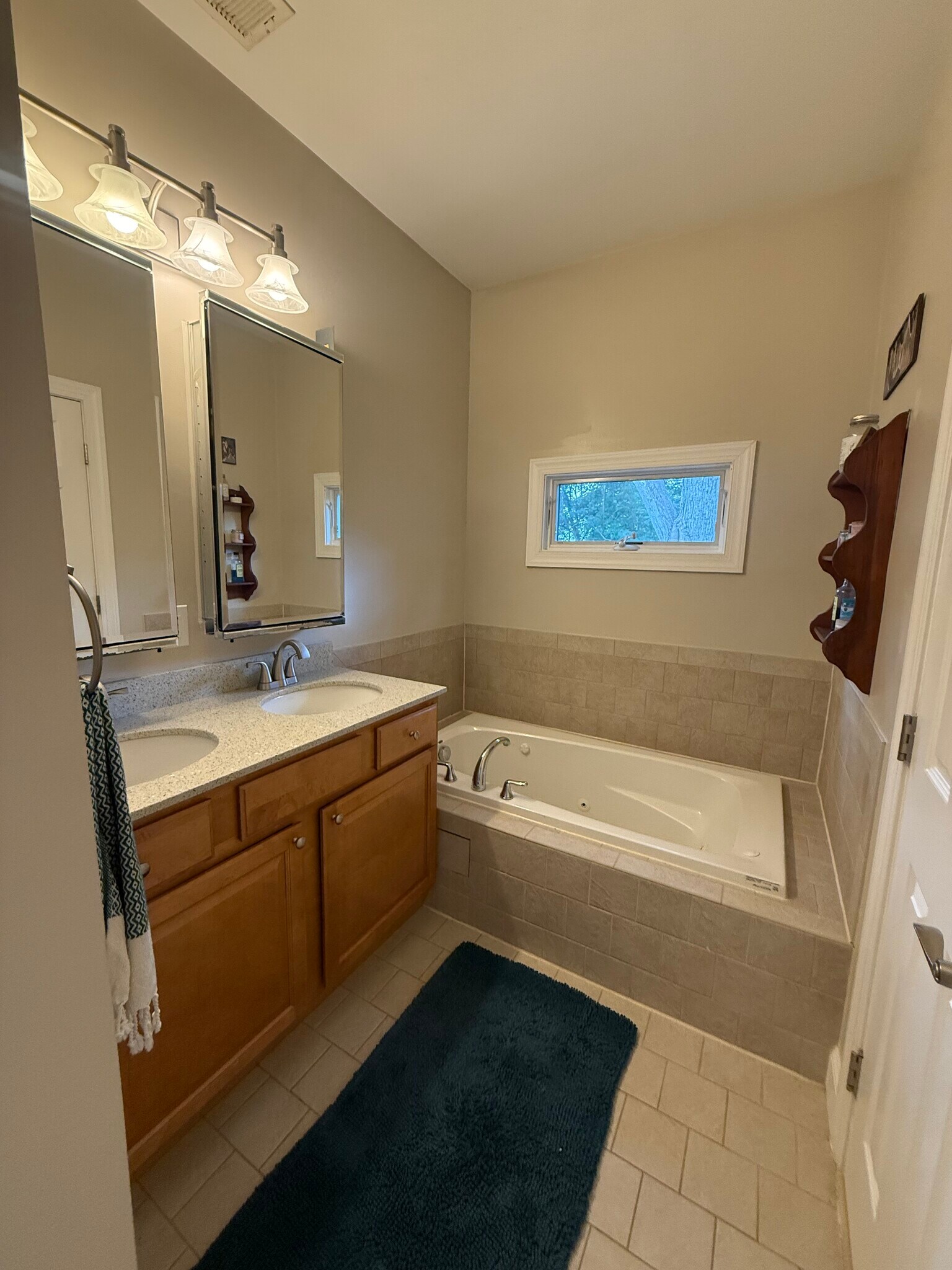 Master bath has shower and large jacuzzi tub - 5715 7th St N