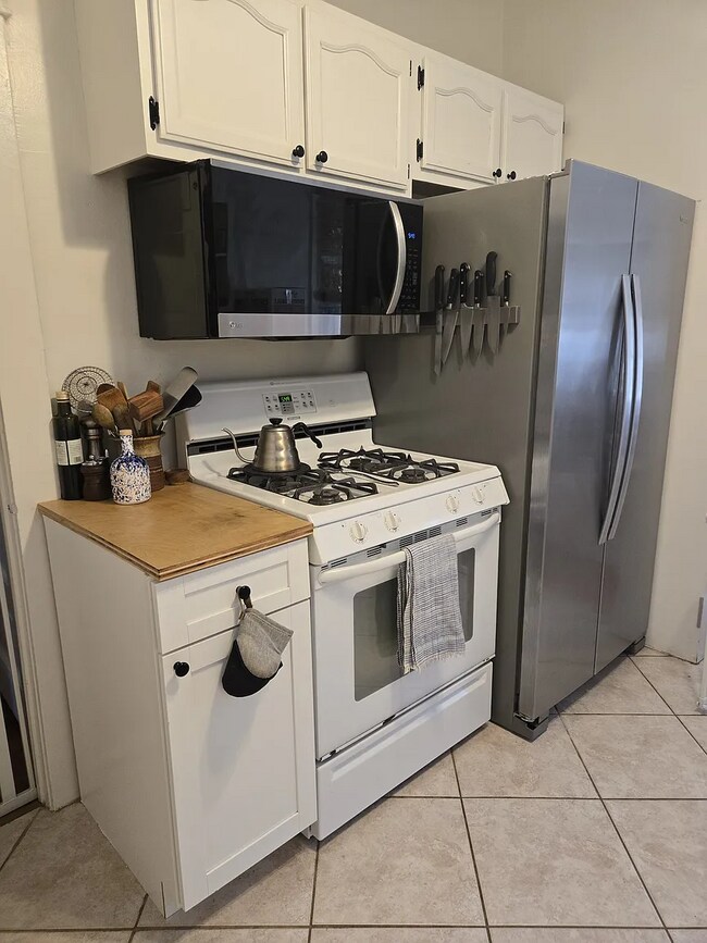New LG Microwave and Stainless Steel Refrigerator - 616 N Wilson Ave