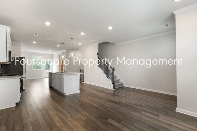 Building Photo - Stylish 3-Level Townhome with Bonus Suite, Deck & Garage – Near I-540 and Shopping