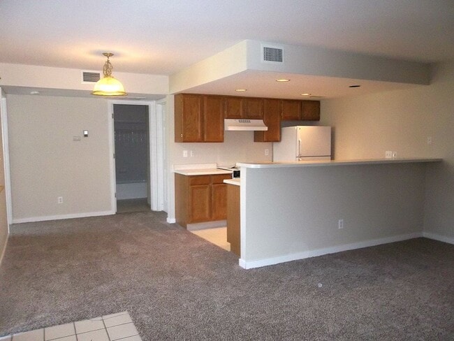Building Photo - Fort Collins Condo Offering Comfort, Convenience, and Simple Living