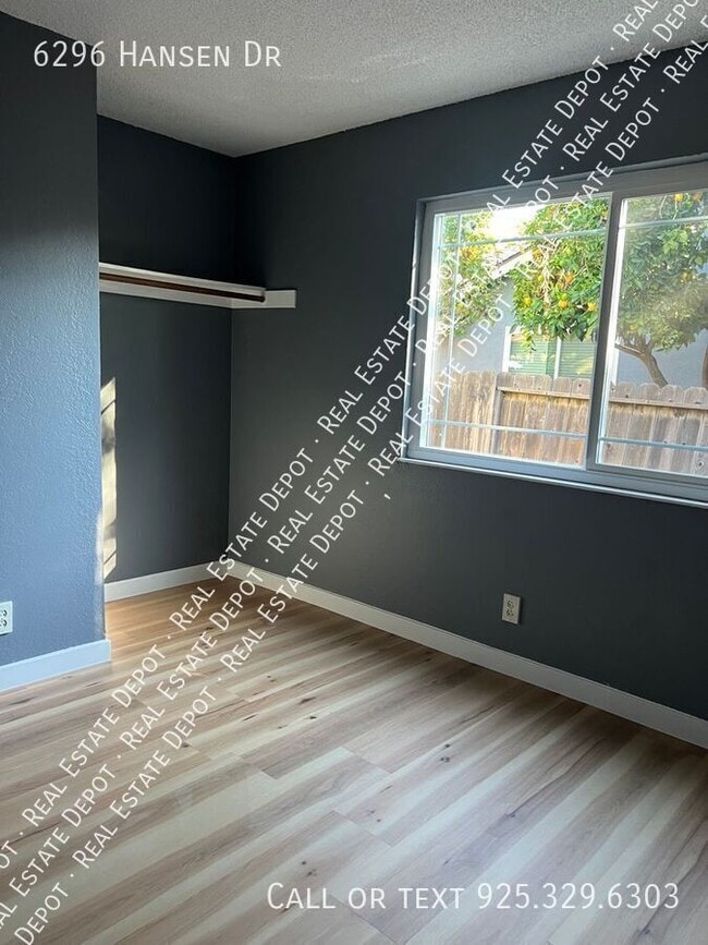 Building Photo - 6296 Hansen Dr