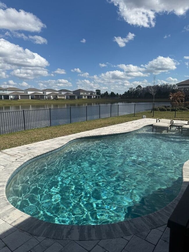 Building Photo - ISLES OF LAKE NONA POOL HOME!!