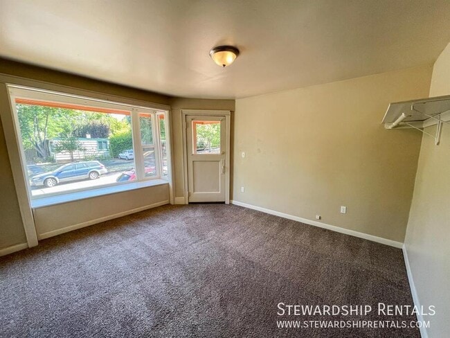 Building Photo - 1648 E 24th Ave