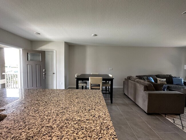 Building Photo - Resort Style Living! Stunning 3/2.5 Townhome in Waterleigh! Available April!