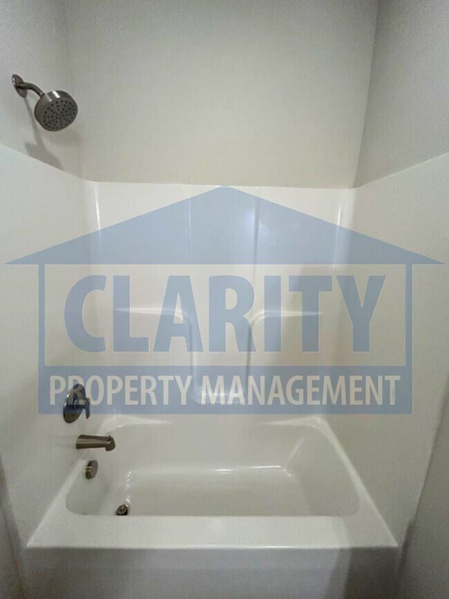 Building Photo - Three bedroom townhome w/ garage!