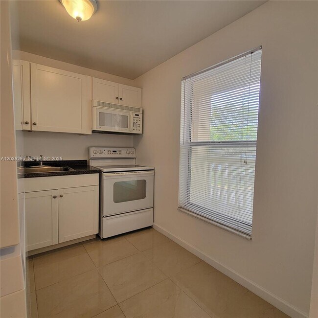 Building Photo - 6021 NW 61st Ave