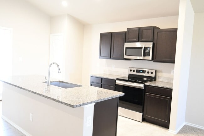 Building Photo - Beautiful Brand New Custom Brick Home 3 bed/ 2 bath/ 2 car garage Open Concept with huge backyard...