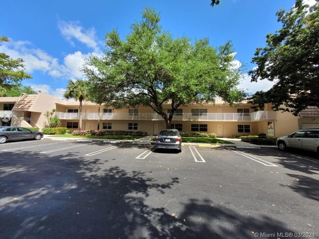 Building Photo - 4261 W Palm Aire Dr