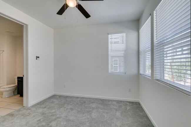 Building Photo - Stunning 4-Level Townhome in Inspirada | R...