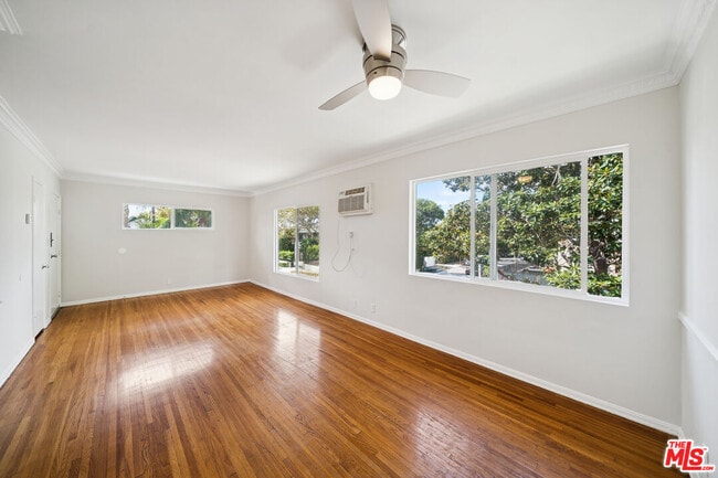 Building Photo - 7571 Willoughby Ave