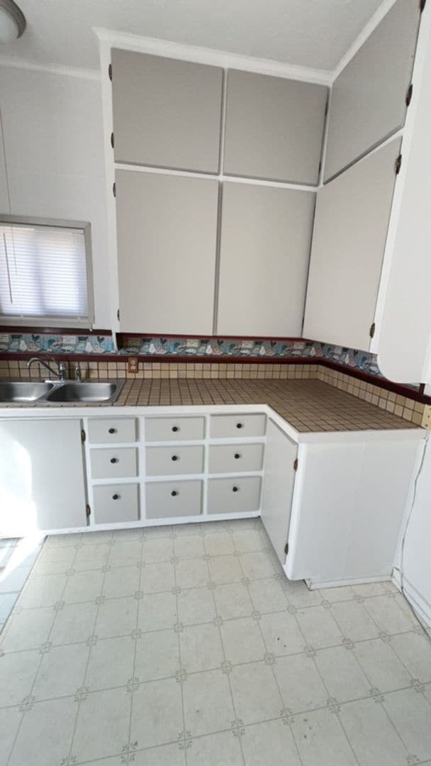 Building Photo - Charming 3-Bedroom Home with Backyard & Patio