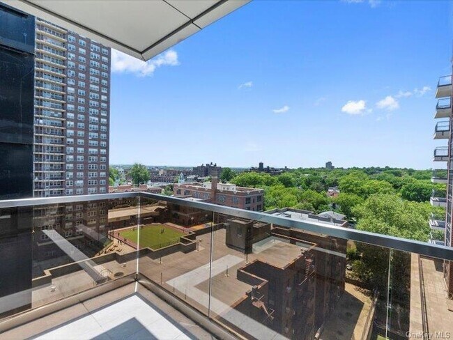 Building Photo - 124-28 Queens Blvd