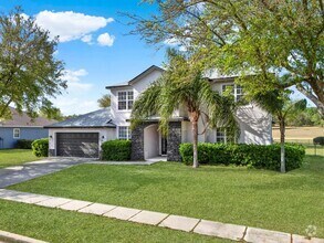 Building Photo - RENOVATED 5 BEDROOM FENCED IN, GOLF FRONTA...