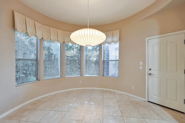 Building Photo - Experience luxury living in the prestigious Gainey Village!
