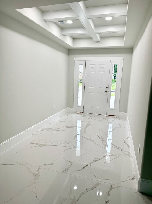 Building Photo - LOOK AT THIS ONE! BEAUTIFUL home with a pond view right outside the back patio!