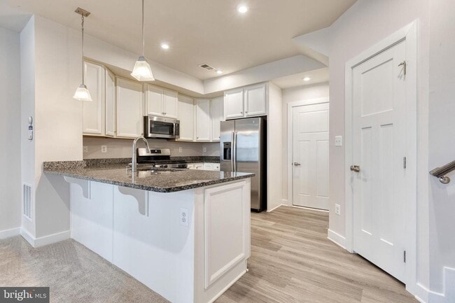 Building Photo - Live in the highly coveted community of Pa...