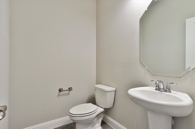 Upstairs half bath - 253 Gill Point Ln