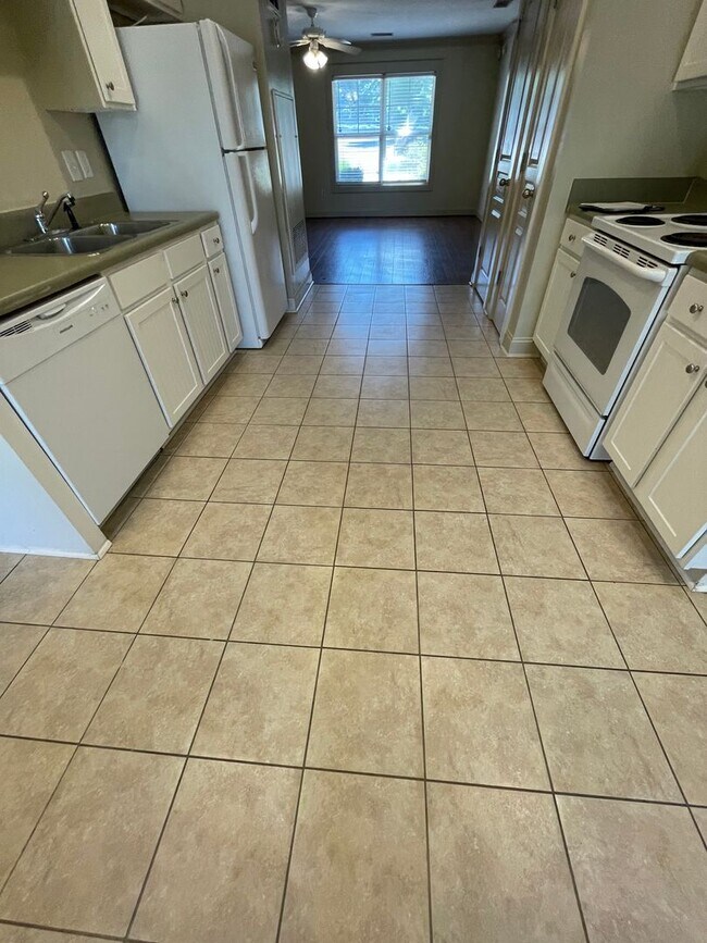 Building Photo - Two Bedrooms Available in this Three Bedroom Flat, Female Applicants!