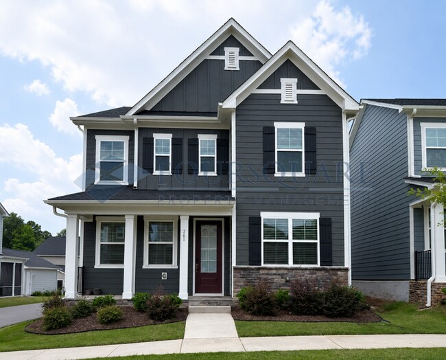 Primary Photo - Spacious Corner-Lot Home with Guest Suite, Screened Porch & Detached 2-Car Garage – Resort-Style ...