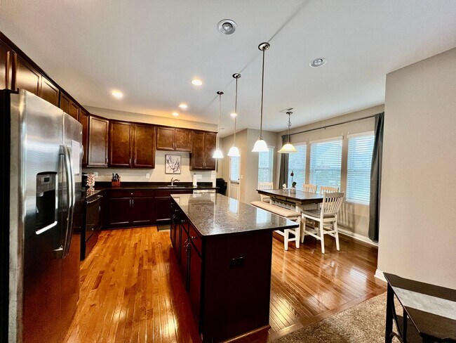 Building Photo - Executive corporate rental features community pool. Fully furnished and includes all utilities.