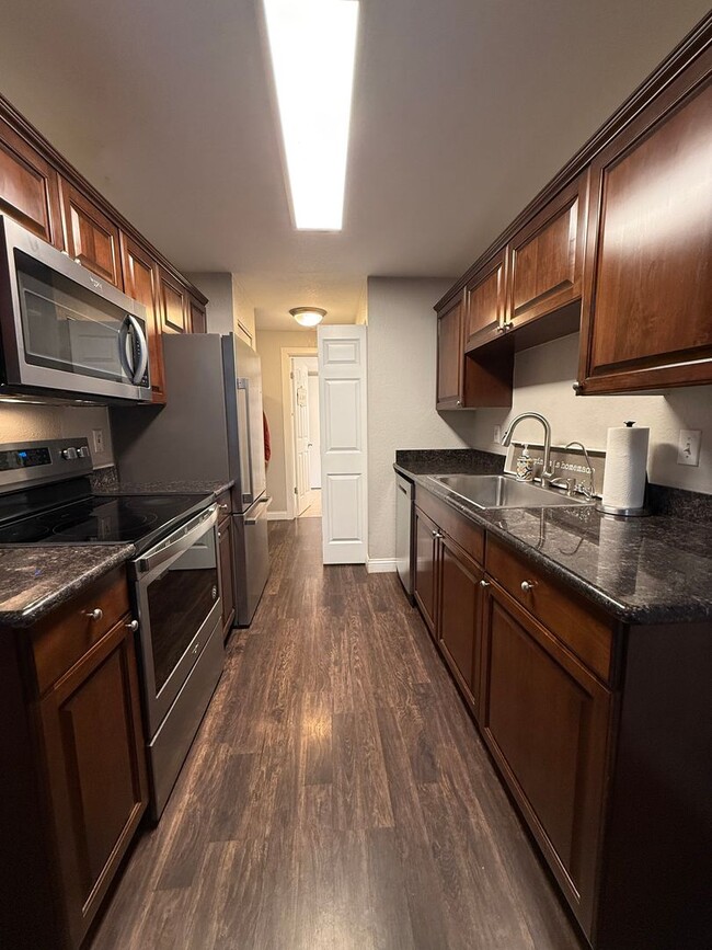 Building Photo - Ground-Level 2-Bedroom Condo at Martha’s Landing – Prime Mill Creek Location