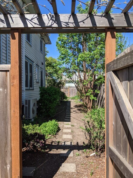 Gate entry to back yard - 540 NW 14th St