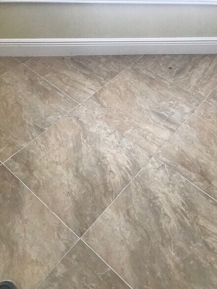 Large Tile in Living Areas/Porch - 144 Reserve Cir