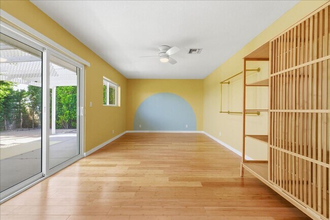 Building Photo - 3 bed / 2 Bath Mid-Century Home with Two-Car Garage, Soaking Pool and Manicured Backyard!