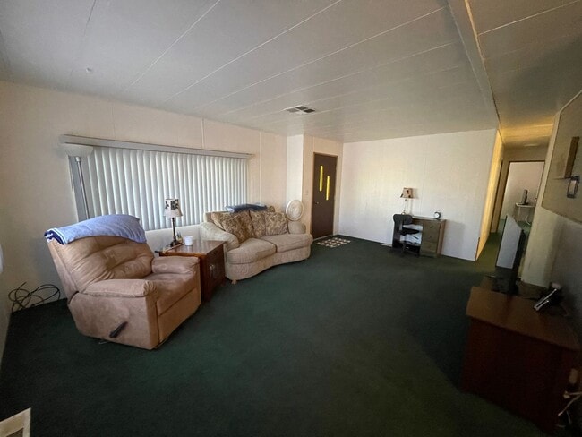 Building Photo - Partially Furnished Manufactured Home on its own Large Corner Lot! *No HOA*