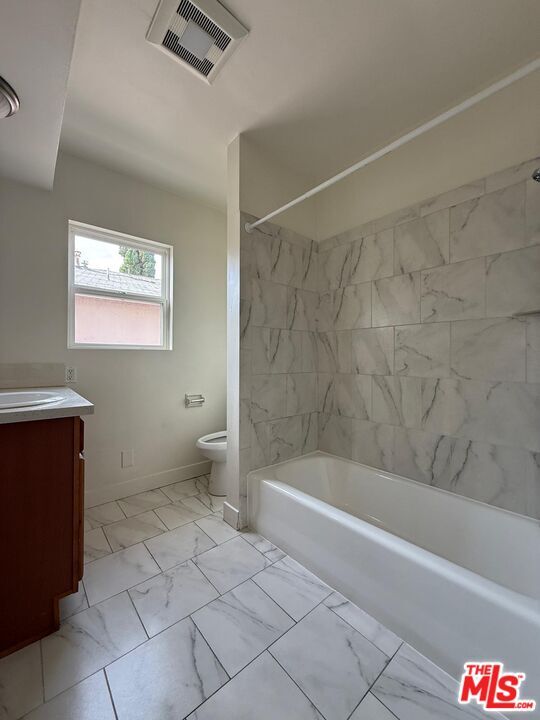 Building Photo - 13233 Oxnard St