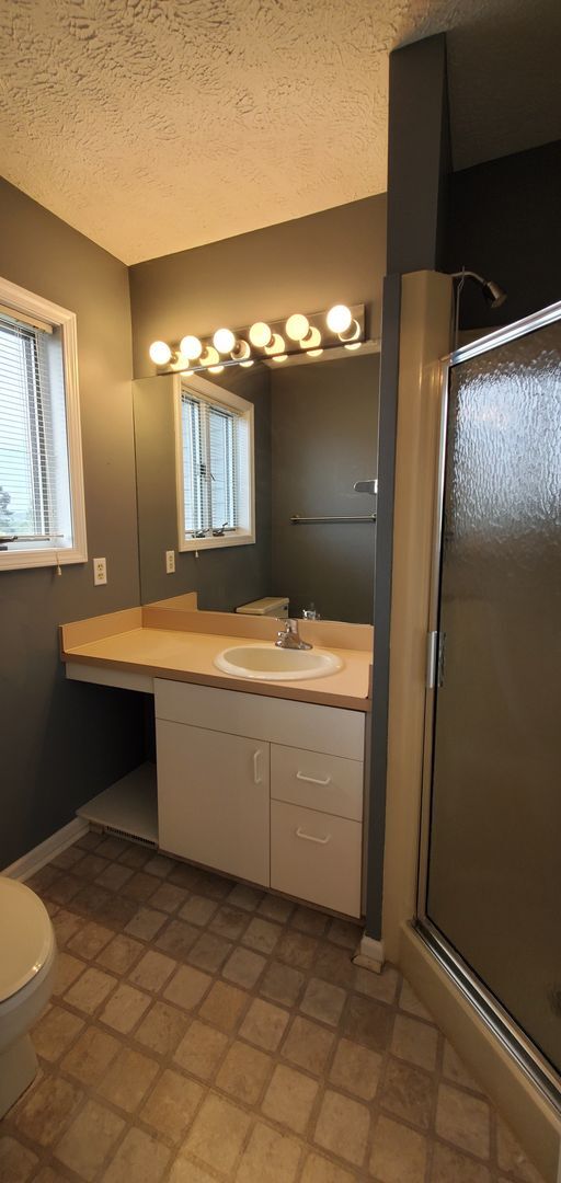 Building Photo - Lakefront End-Unit Condo with Crystal Lake...