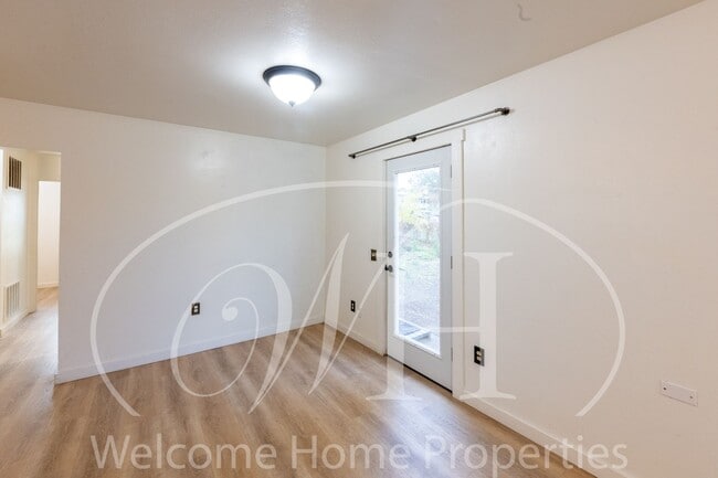 Building Photo - Comfortable 3-Bedroom Home with Fenced Yard and Attached Carport