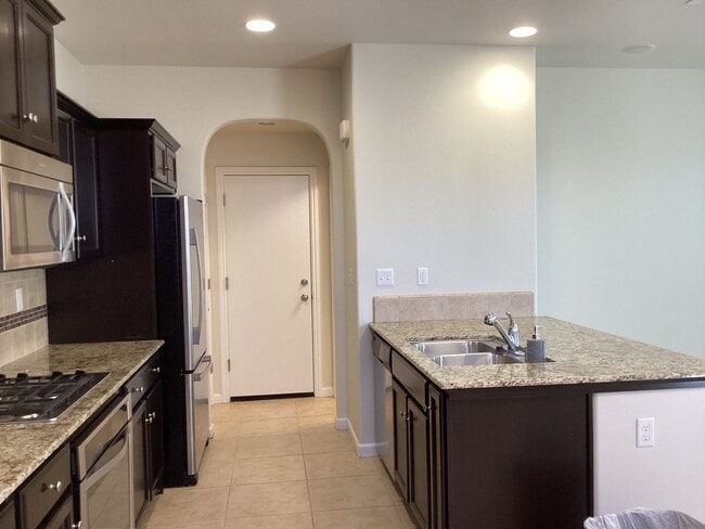 Building Photo - 7009 Harmony Dr