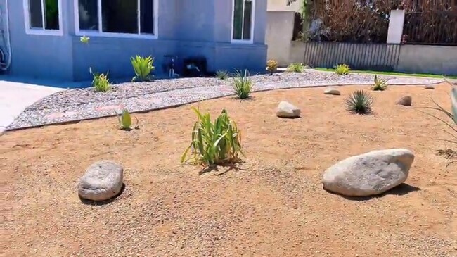 Building Photo - Modern Retreat with Spacious Yard & Cozy Interiors