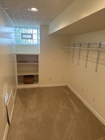 Finished storage room in basement. - 5101 Boulevard Pl