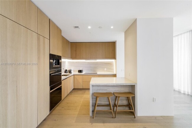 Building Photo - 8701 Collins Ave
